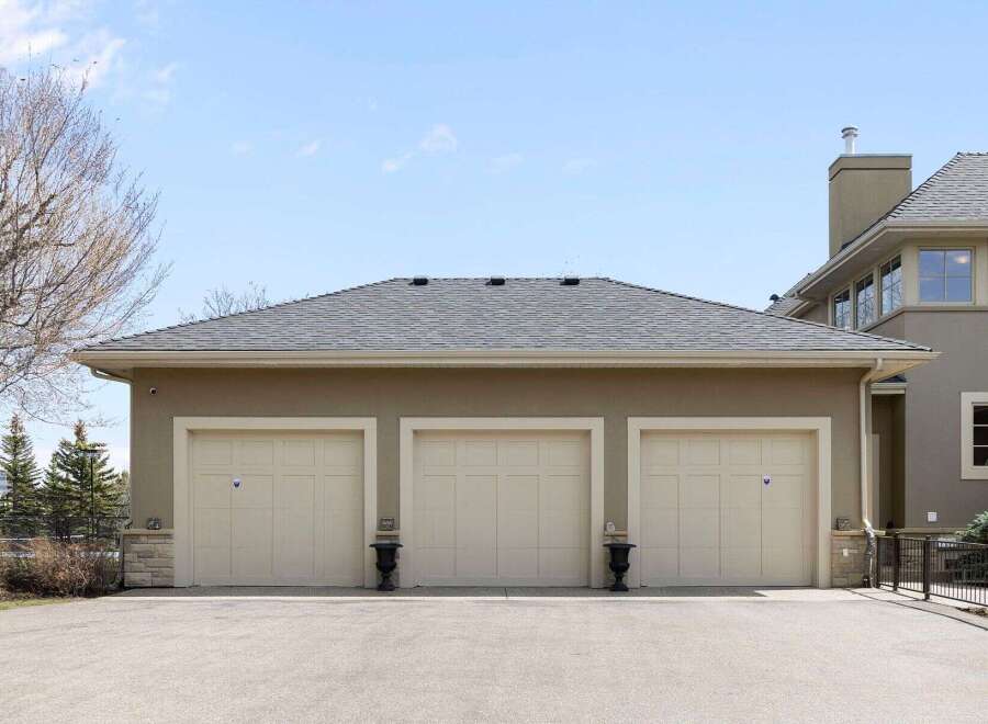 This stunning property boasts a spacious three-car garage, perfect for housing vehicles and providing ample storage.