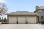 This stunning property boasts a spacious three-car garage, perfect for housing vehicles and providing ample storage.