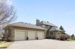 This stunning property boasts a spacious three-car garage, perfect for car enthusiasts or extra storage.