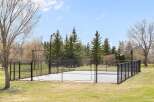 Enjoy outdoor recreation at its finest with this property's private basketball court.