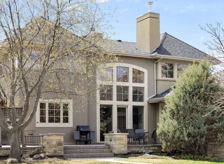 This stunning property boasts a beautiful exterior with a modern design and ample natural light.