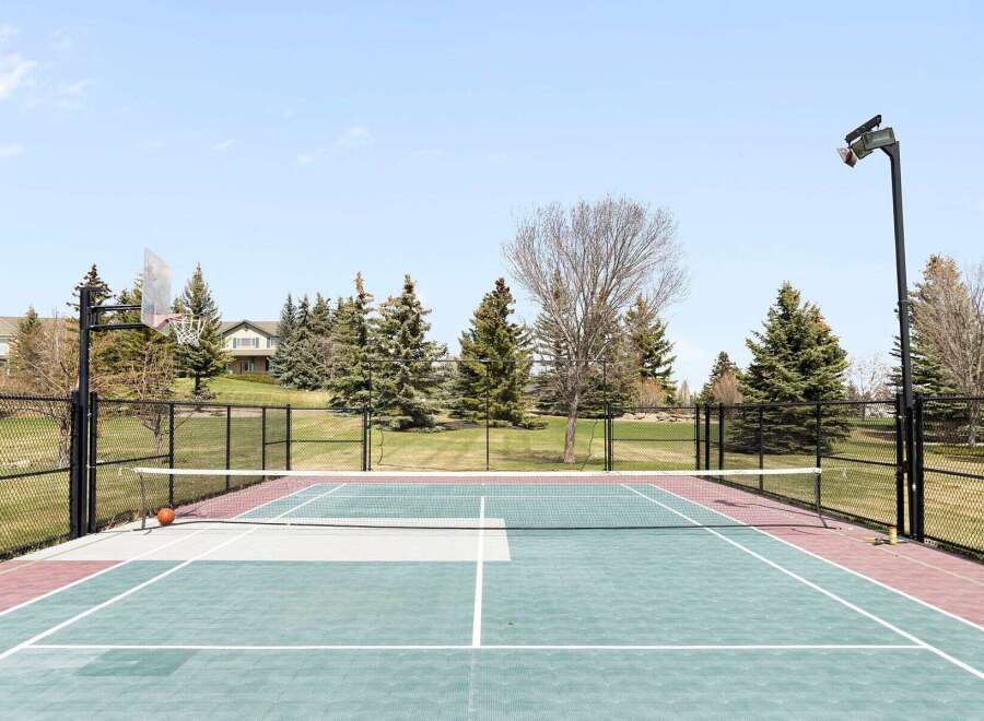 Enjoy outdoor recreation at its finest with this property featuring a versatile sports court.