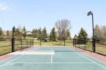 Enjoy outdoor recreation at its finest with this property featuring a versatile sports court.
