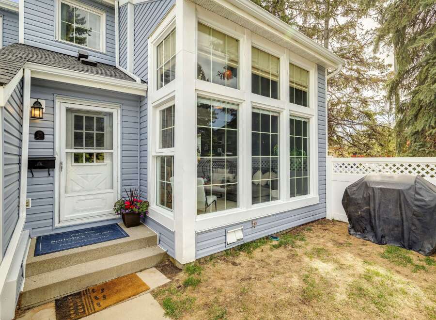 This charming home boasts a beautiful exterior with a welcoming entrance.
