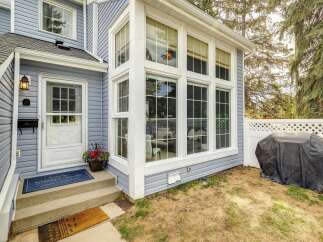 This charming home boasts a beautiful exterior with a welcoming entrance.