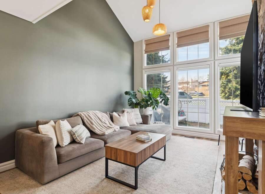 Step into luxury with this stunning living room! Featuring a cozy sectional sofa, a stylish coffee table, and a beautiful rug, this space is perfect for relaxation and entertaining.