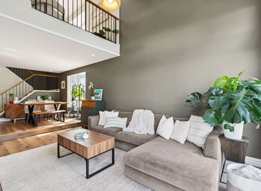 Step into luxury with this stunning property, featuring a spacious living area perfect for entertaining.