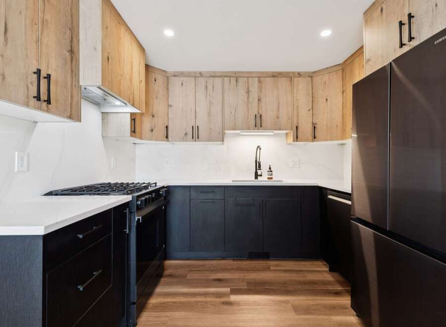 This stunning kitchen boasts a modern design with a touch of rustic charm.