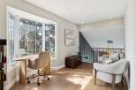 This stunning property boasts a bright and airy home office with a large bay window, perfect for enjoying natural light and scenic views.