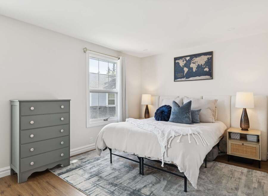Step into a serene bedroom retreat, where comfort meets style.