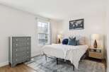Step into a serene bedroom retreat, where comfort meets style.