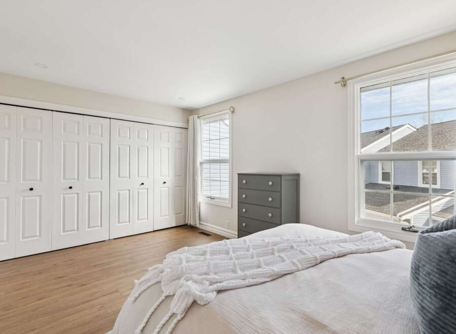 This inviting bedroom features a spacious layout with ample natural light.