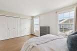 This inviting bedroom features a spacious layout with ample natural light.