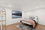 This inviting bedroom boasts a serene ambiance, perfect for relaxation.