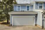 This charming townhome features a spacious two-car garage, perfect for parking and storage.
