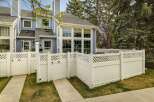 Discover this charming townhome with a welcoming facade and a private, fenced-in yard.