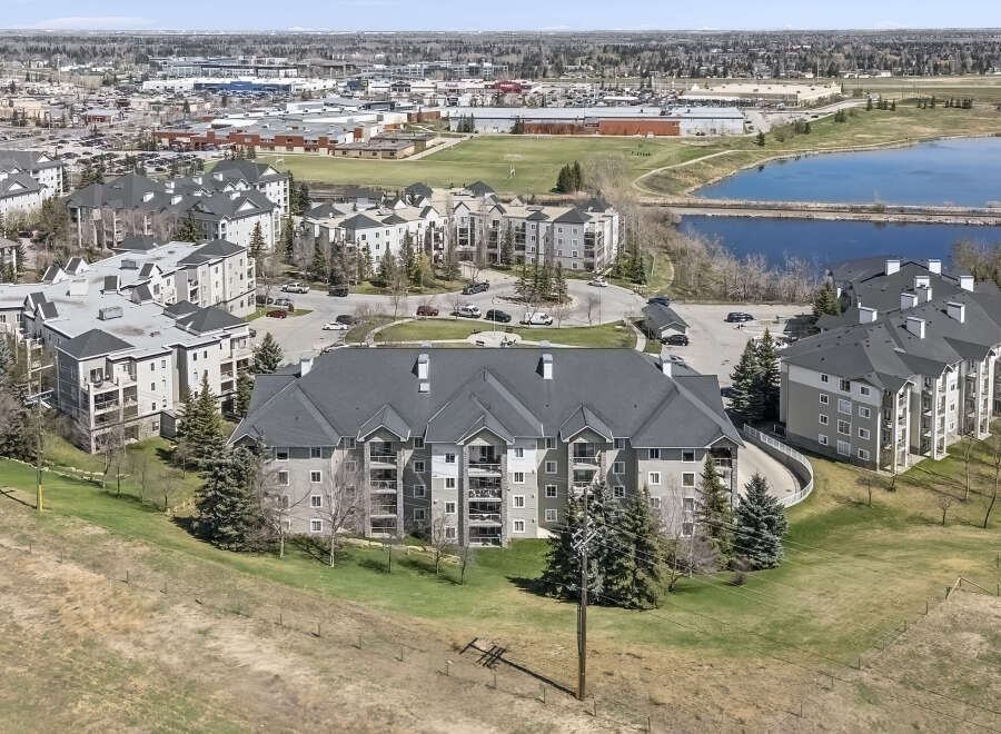 Discover a stunning property with modern apartments and a serene lake view.