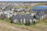 Discover a stunning property with modern apartments and a serene lake view.