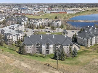 Discover a stunning property with modern apartments and a serene lake view.