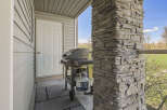 Enjoy outdoor cooking with this charming property featuring a convenient grill setup on the porch.