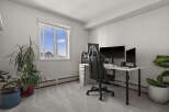 This bright and airy home office features a modern desk setup, perfect for productivity.