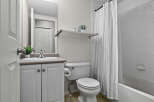 This charming bathroom features a clean and bright aesthetic, perfect for a relaxing start to your day.