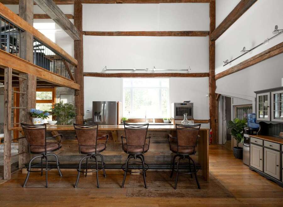 This stunning property boasts a rustic yet modern kitchen, perfect for entertaining and everyday living.