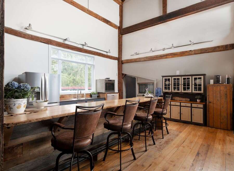 This stunning kitchen boasts a rustic, yet modern design, perfect for entertaining.
