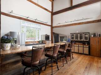 This stunning kitchen boasts a rustic, yet modern design, perfect for entertaining.