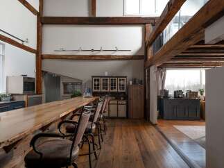 Step into rustic elegance with this stunning property featuring exposed wooden beams and a spacious layout.