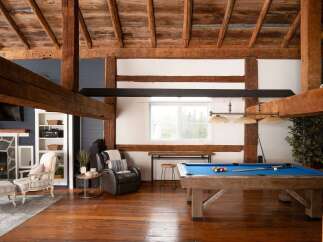 This stunning property boasts a rustic charm with exposed wooden beams and a spacious layout.