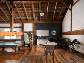 This stunning property boasts a unique blend of rustic charm and modern amenities.