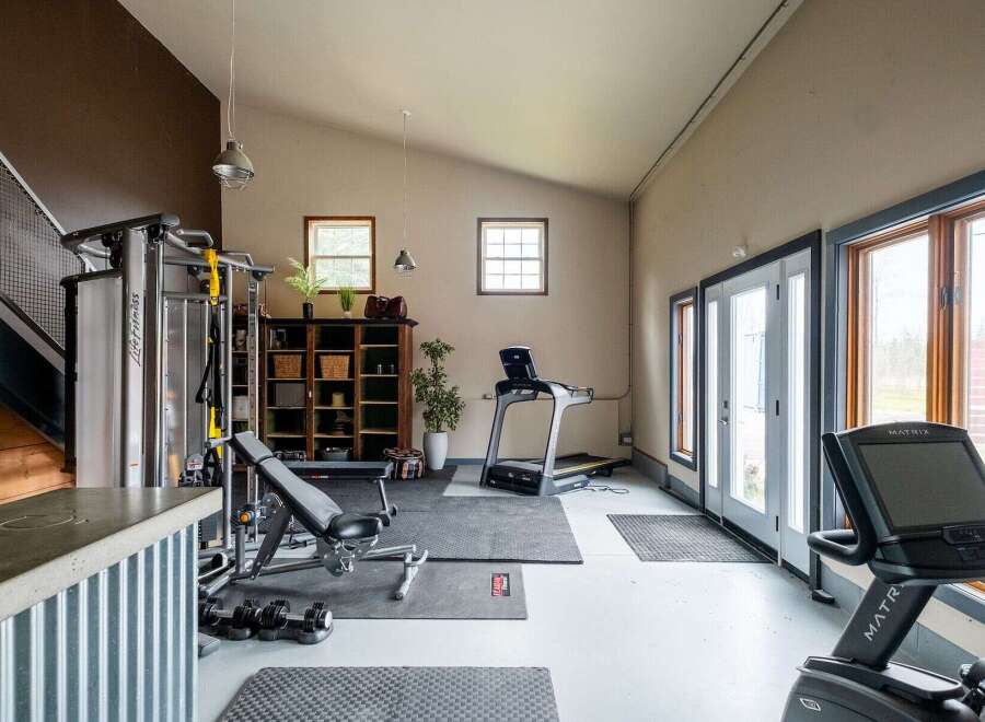 This spacious home gym offers a dedicated space for fitness enthusiasts.