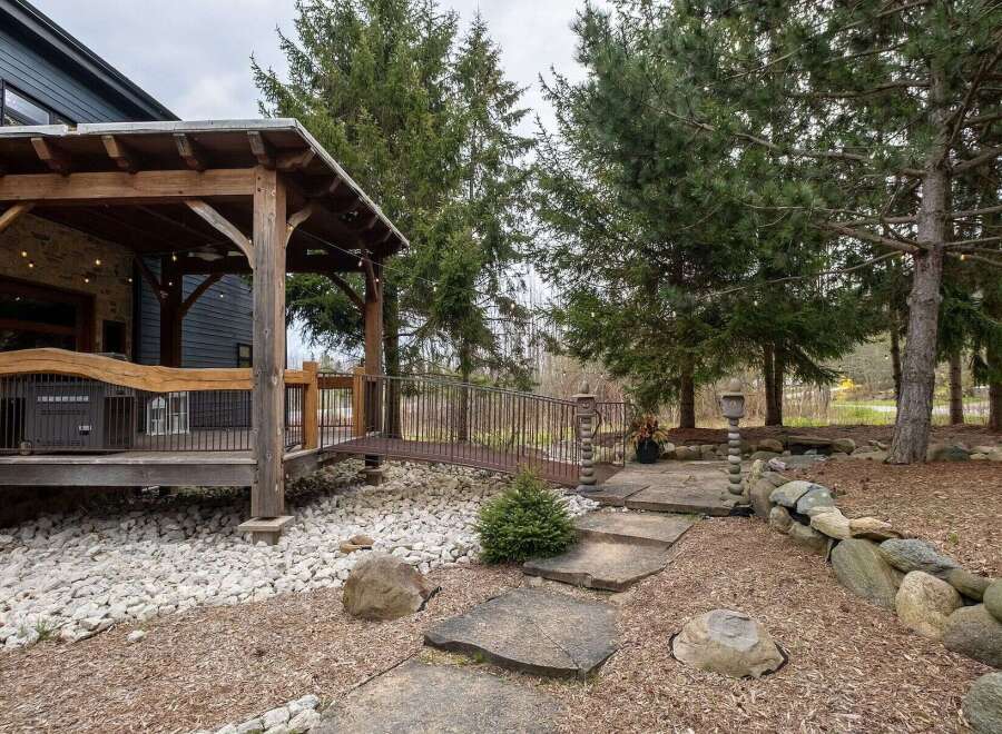 Discover a stunning property featuring a charming outdoor space.