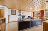 This stunning property boasts a cozy living room with a fireplace, perfect for relaxing evenings.