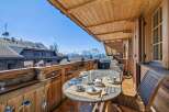 Enjoy breathtaking mountain views from this charming balcony.