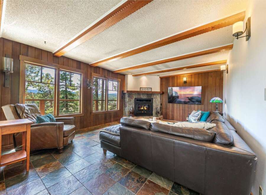 Step into a cozy living space with stunning views.
