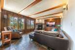 Step into a cozy living space with stunning views.