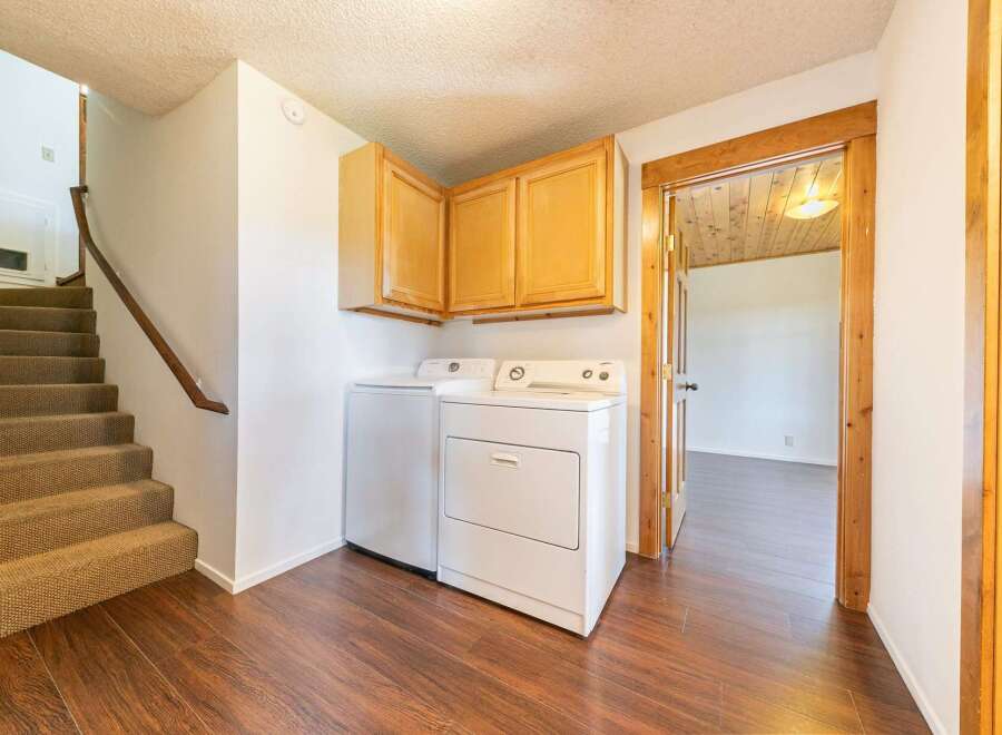 Discover the convenience of this home's dedicated laundry area, complete with a washer and dryer.