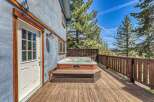 Relax and unwind in this stunning property featuring a luxurious hot tub on a spacious deck.
