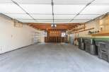 Discover the potential of this spacious garage, perfect for storage or a workshop.