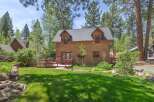 Nestled amidst lush greenery, this charming cabin offers a serene escape.