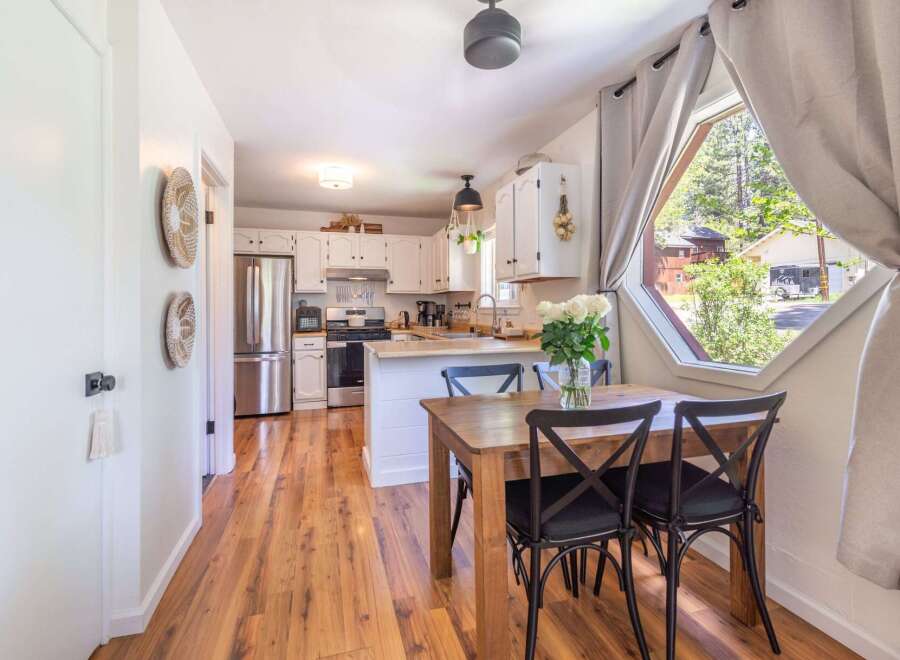 Step into this charming kitchen and dining area, perfect for creating lasting memories.