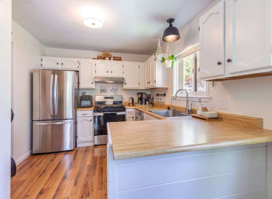 Step into this bright and inviting kitchen, perfect for culinary adventures and family gatherings.