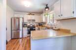 Step into this bright and inviting kitchen, perfect for culinary adventures and family gatherings.