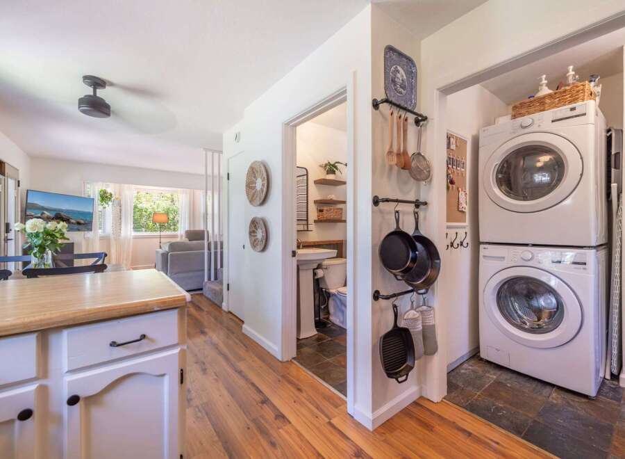 Discover the charm of this beautifully designed home! Featuring a modern kitchen with ample storage and a cozy living area, perfect for entertaining.