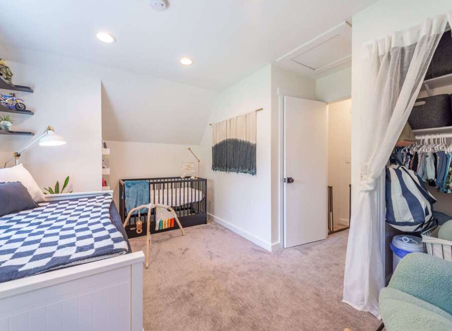 This charming nursery offers a cozy and inviting space for your little one.