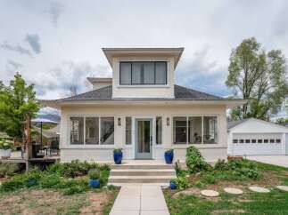 This charming home boasts a beautiful exterior with a welcoming entrance.