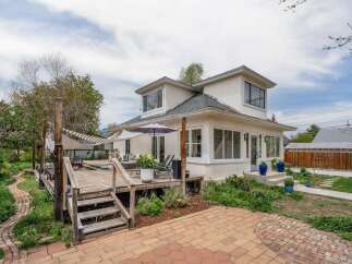 This stunning property boasts a beautiful deck, perfect for outdoor entertaining and relaxation.