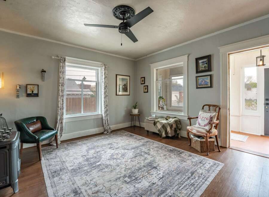 Step into this charming living space, featuring a cozy ambiance and elegant design.